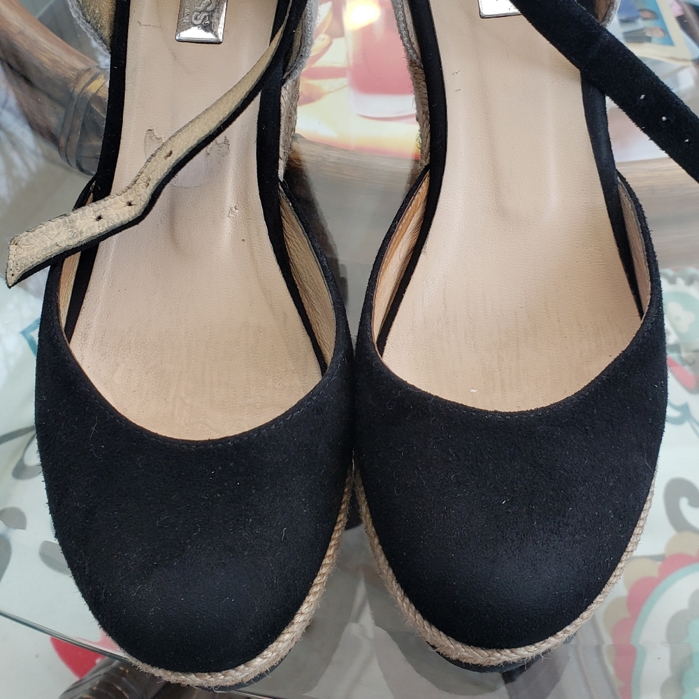 Black suede wedges.